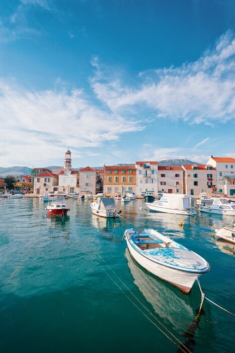 Poster Kastel coast in Dalmatia,Croatia. A famous tourist destination on the Adriatic sea. Fishing boats moored in old town harbor.
