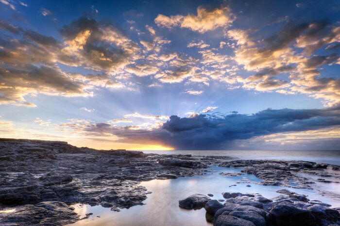 Poster Landschaft mit einer felsigen Küste