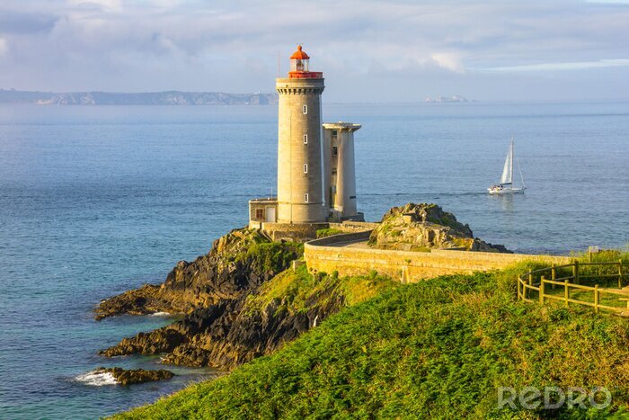 Poster Leuchtturm in der Sonne