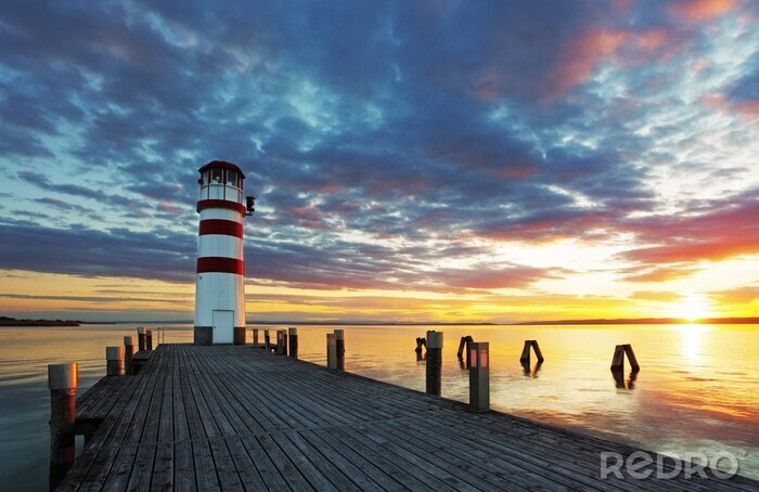 Poster Leuchtturm und Sonnenuntergang