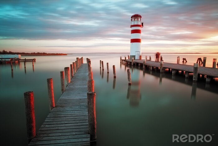 Poster Meer Leuchtturm am Abend