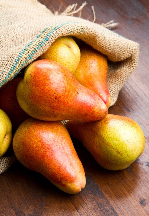 Poster Obst Birnen aus einem Jutesack verschüttet