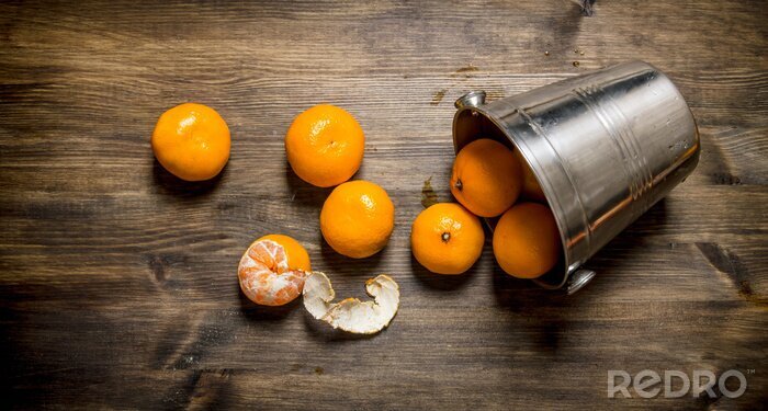 Poster Obst Mandarinen aus einem Blecheimer verschüttet