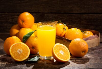 Poster Orangen und ein Glas Saft