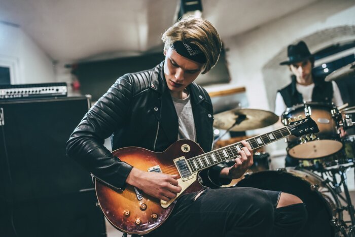 Poster Schlagzeuger und Gitarrist der Band