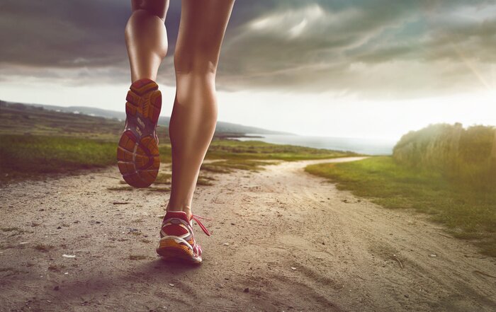 Poster Schlanke Beine eines Läufers