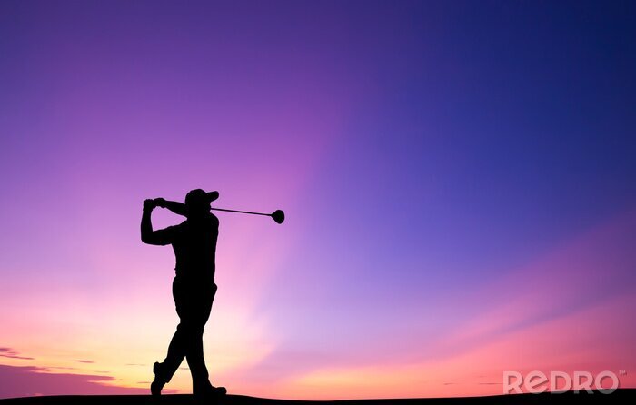 Poster Silhouette eines Golfers gegen den Himmel