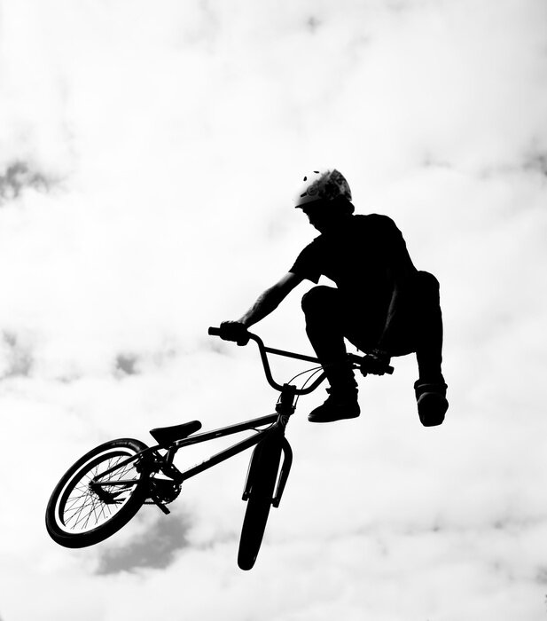 Poster Silhouette von bmx Fahrer in Aktion