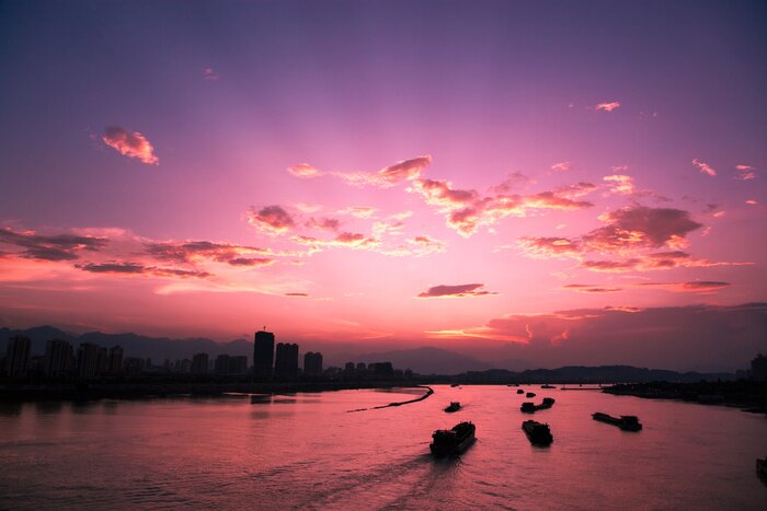Poster Stadtlandschaft bei Sonnenuntergang