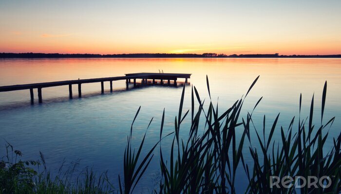 Poster Steg mit abendlichem Himmelhintergrund