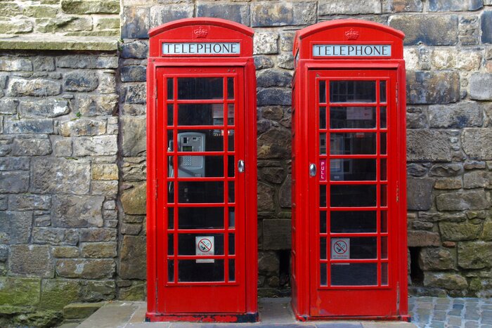 Poster Telefonzellen neben einem Gebäude