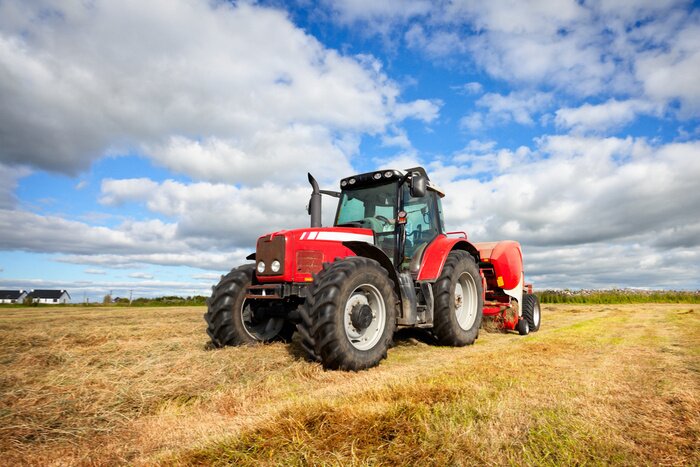 Poster Traktor, der Heuschober auf dem Feld, Panning-Technik