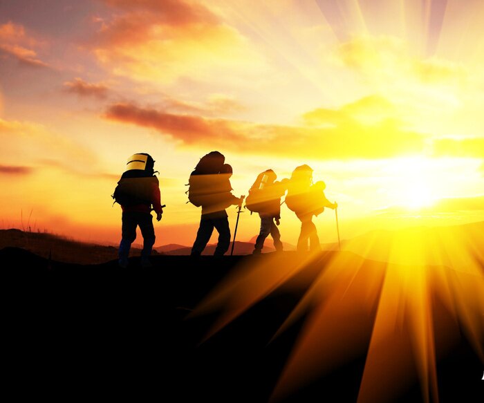 Poster Trekking bei Sonnenuntergang