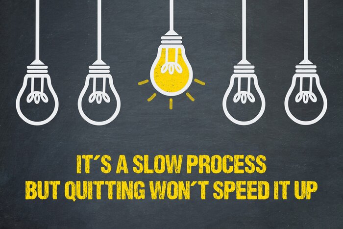 Poster Typografische Illustration mit einer leuchtenden Glühbirne