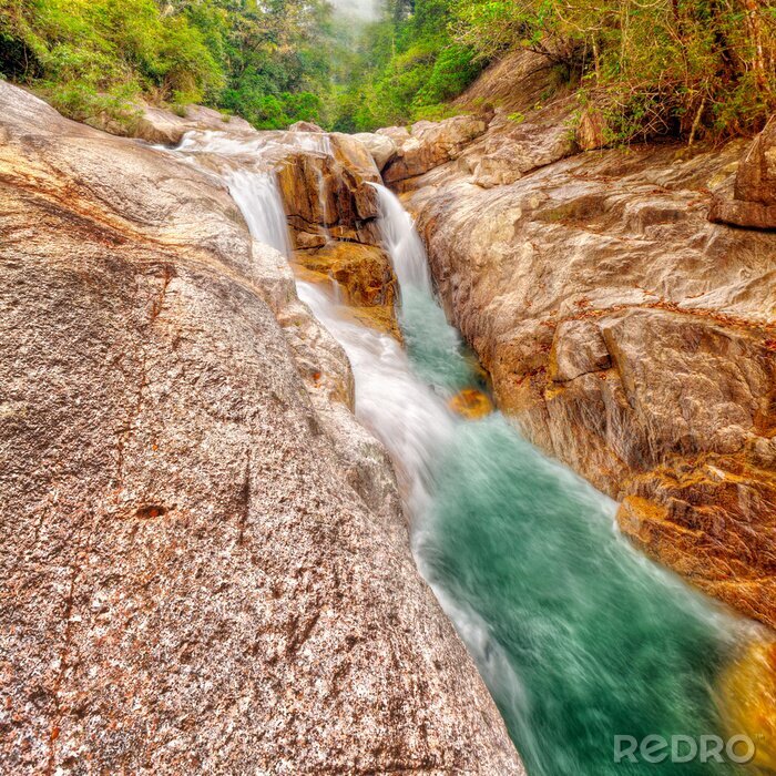 Poster Wasserfall und reißender Fluss