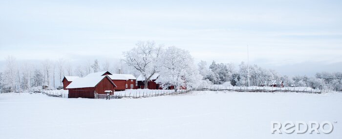 Poster Winterlandschaft mit Bauernhof