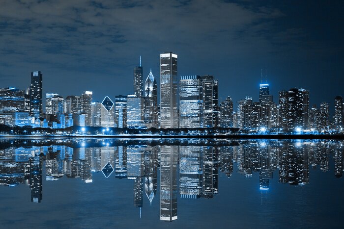 Poster Wolkenkratzer in Chicago spiegeln sich nachts im Wasser