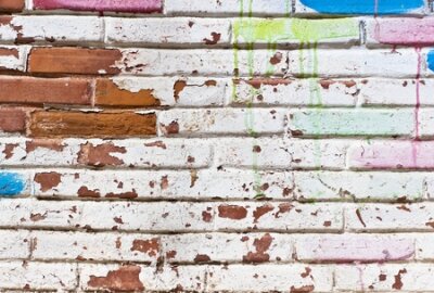 Poster Ziegelmauer und abblätternde Farbe