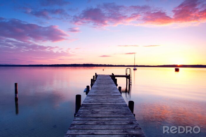 Sticker Bootssteg mit buntem Himmelhintergrund