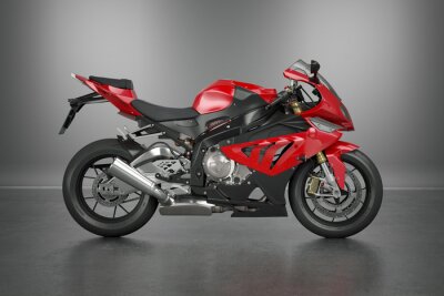 Fototapete Ein leistungsstarkes Motorrad mit roten Akzenten auf grauem Hintergrund