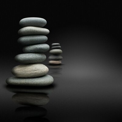 Sticker Entspannung sur fond noir, Pierres empilées Zen-Haltung