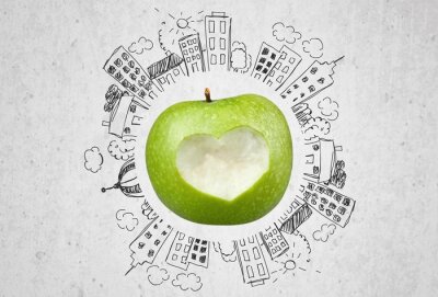 Sticker Grüner Apfel umgeben von Gebäuden