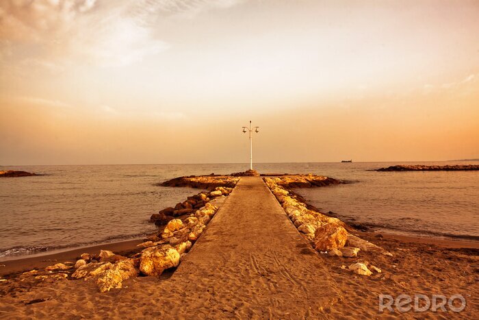 Sticker Landschaft mit Mole am Meer