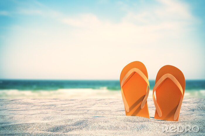 Sticker Orange flip flops on beach
