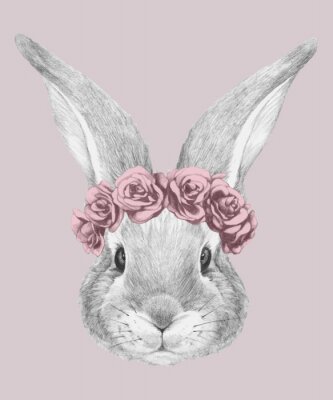 Porträt eines Kaninchens mit Blumenkranz auf rosa Hintergrund