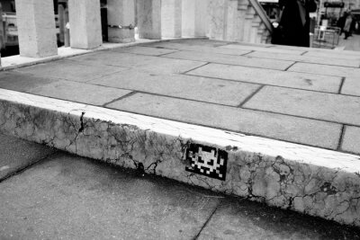 Sticker Sticker graffiti on a bridge in Venice