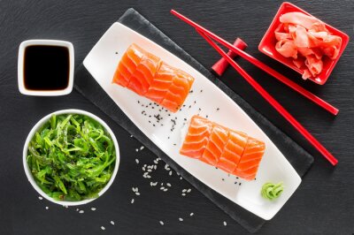 Sticker Sushi Zusammensetzung auf einem schwarzen Hintergrund