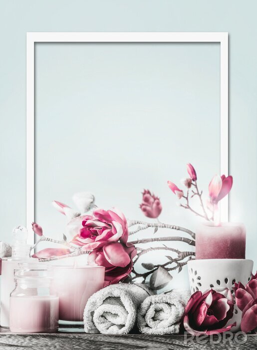 Sticker Wellness frame with body care cosmetic products, candles, flowers and towels at light blue background with copy space. Healthy still life. Spa layout