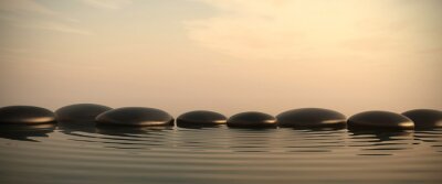 Sticker Zen Steine ​​im Wasser am Sonnenaufgang