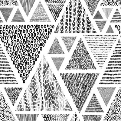 Tapete Hand-drawn triangles in doodle style seamless pattern. Black and white print for textiles. Ethnic and tribal motifs.