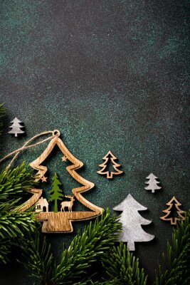 Weihnachten Overhead shoot of wooden christmas tree and decoration. Winter holidays background with copy space, flat lay, top view.